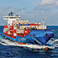 Cargo ship carrying intermodal shipping containers
