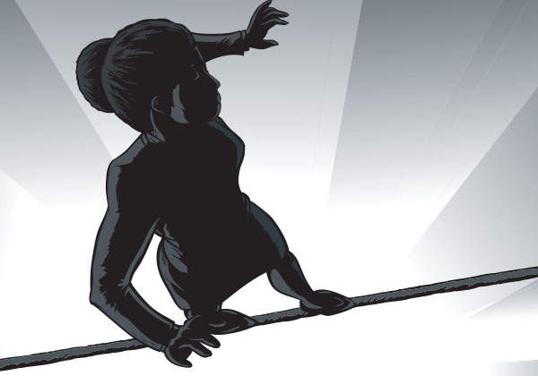 businesswoman on a tightrope